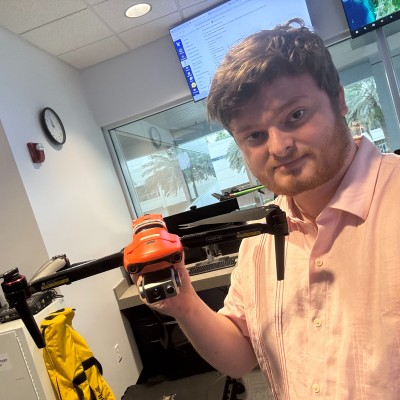Bryce Pacheco holding a drone